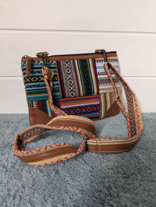 Gheri cotton and leather trim patchwork clutch bag